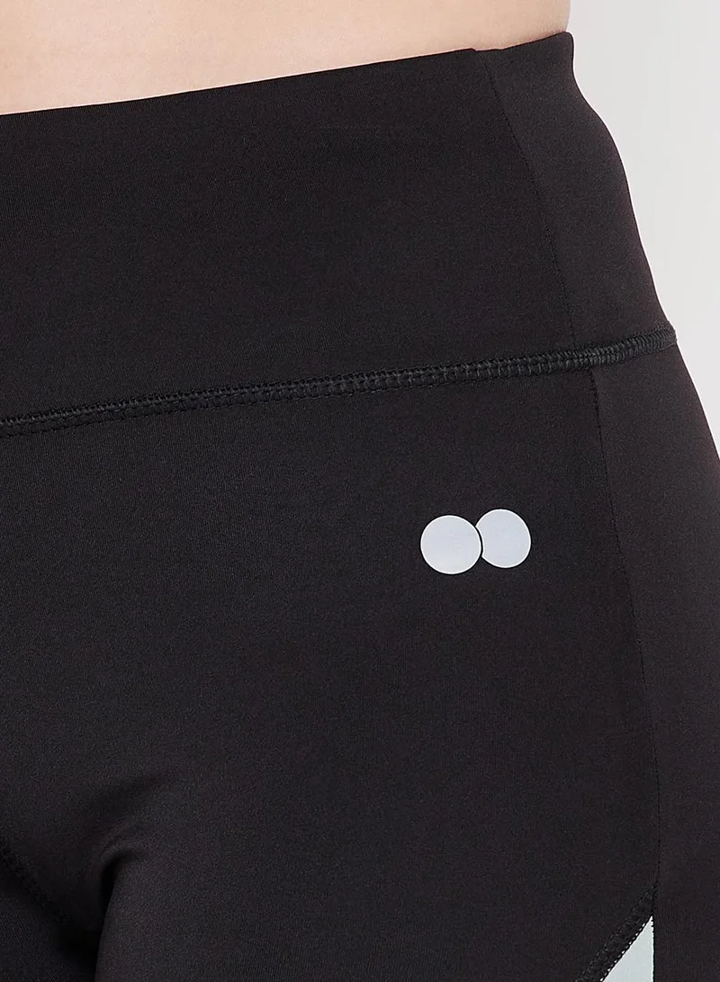 Clovia Black Snug Fit High-Rise Active Tights in Black for Women | Best Price UAE